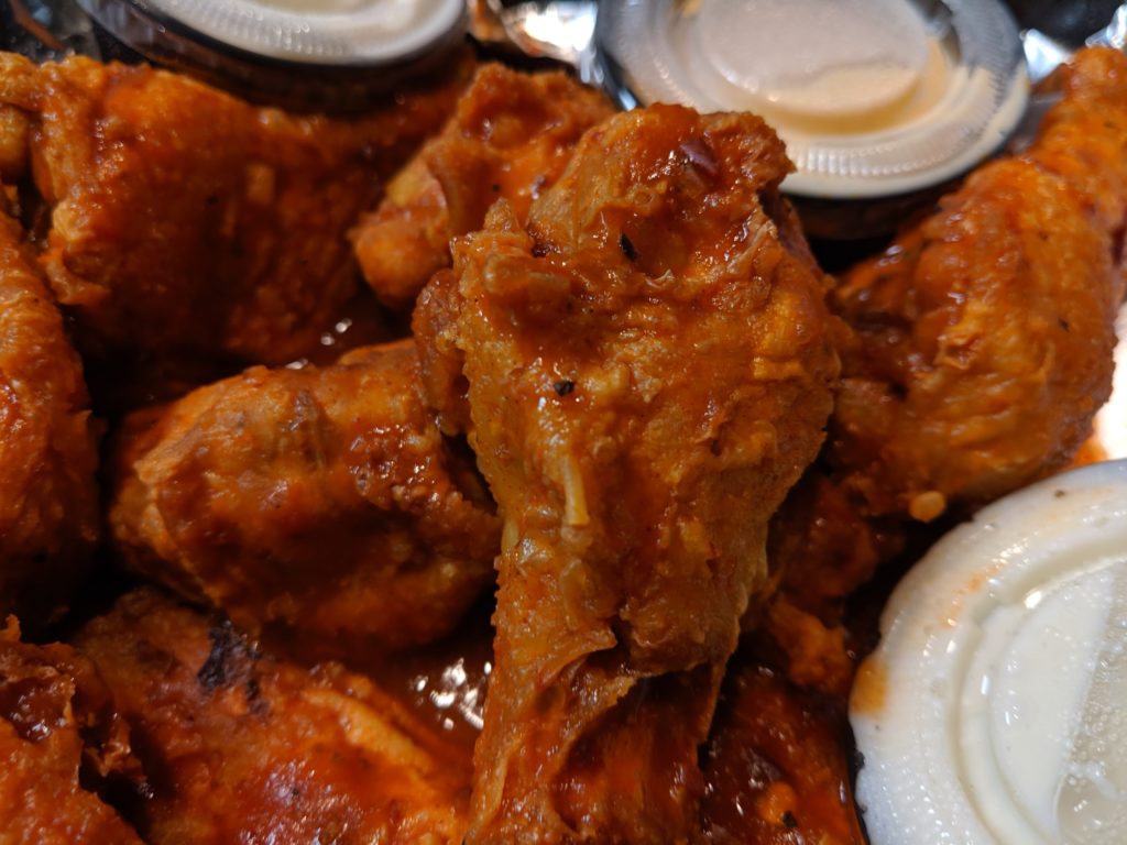 close up filling station 911 wings via fartley farms