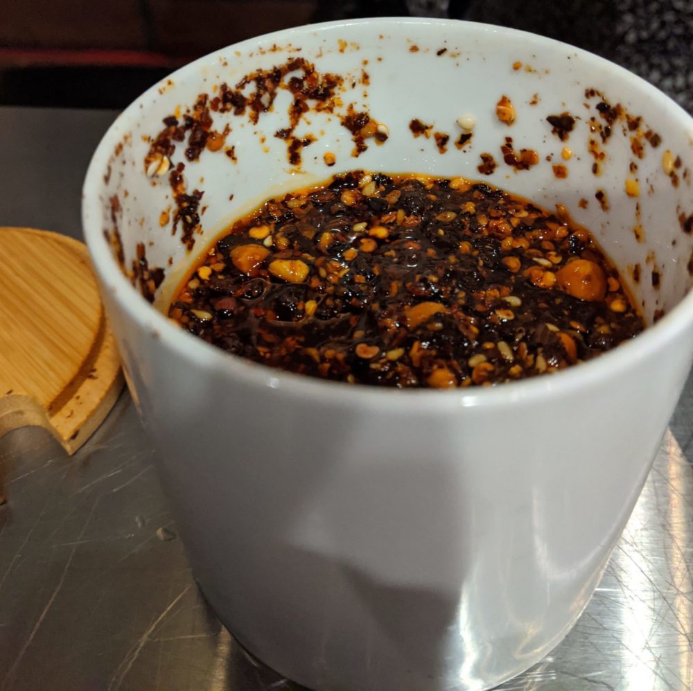 spicy jar of pepper paste in noodle topia by fartley farms