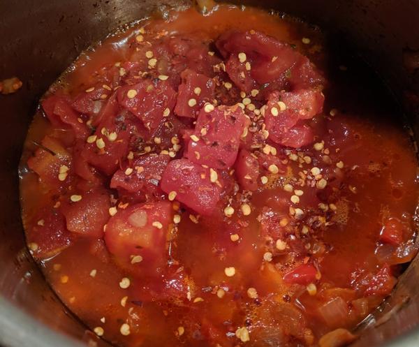 all diavolo ingredients in the pan