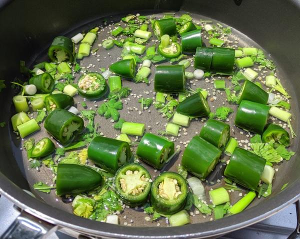 jalapeño hot sauce cooking by Fartley Farms