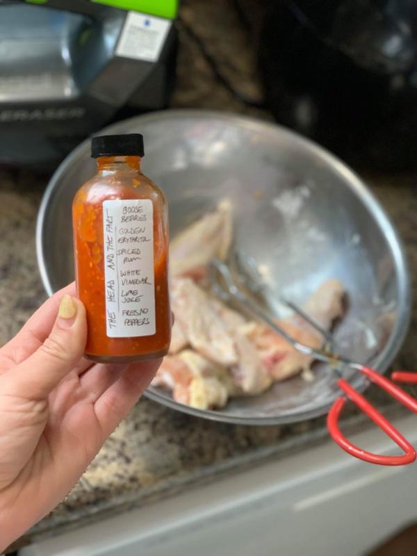 The Head and the Fart Hot Sauce used to slather some wings. 